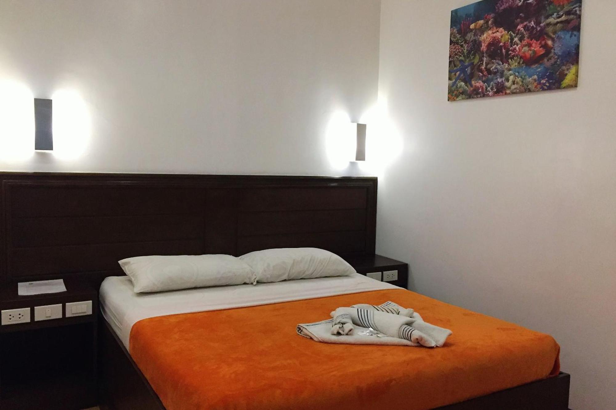 Pearli View Hotel Iloilo Powered By Cocotel Quarto foto